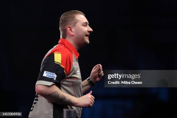 Dimitri Van den Bergh of Belgium celebrates after winning his Fourth Round match against Kim Huybrechts of Belgium during Day Eleven of The Cazoo...