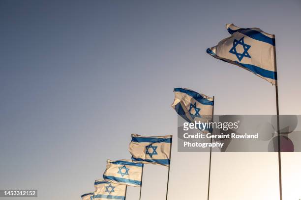 flags of israel - israel flag stock pictures, royalty-free photos & images