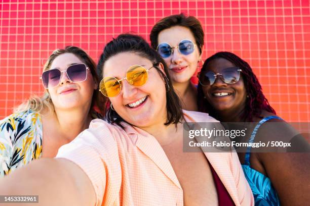 group of plus size women with swimwear at the beach,barcelona,spain - chubby teenager stockfoto's en -beelden