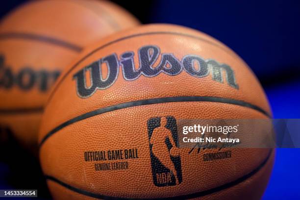 Wilson brand official game ball basketball is pictured with the NBA logo on the court during the game between the Detroit Pistons and Orlando Magic...