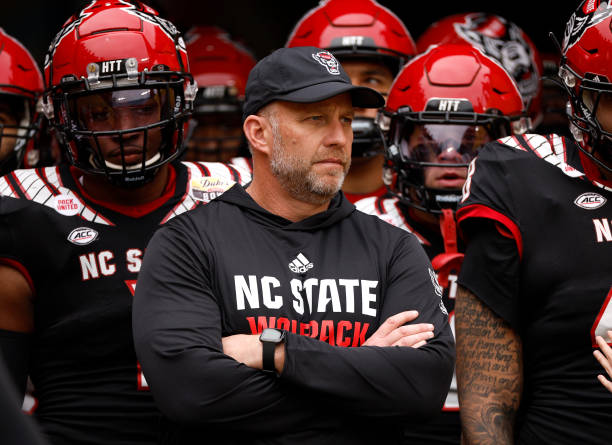 Head coach Dave Doeren of the North Carolina State Wolfpack waits to lead his team to the field prior to the Duke's Mayo Bowl against the Maryland...