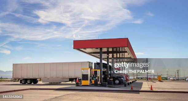 semi trucks refueling at gas station in texas, usa - trucker stops stock pictures, royalty-free photos & images