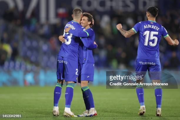 Getafe players Stefan Mitrovic , Luis Milla and Omar Alderete celebrate their victory after during the LaLiga Santander match between Getafe CF and...