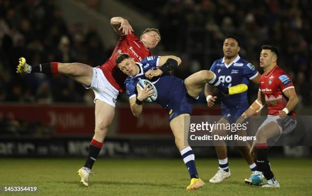 Sam James of Sale Sharks is tackled by Harry Potter during the Gallagher Premiership Rugby match between Sale Sharks and Leicester Tigers at AJ Bell...