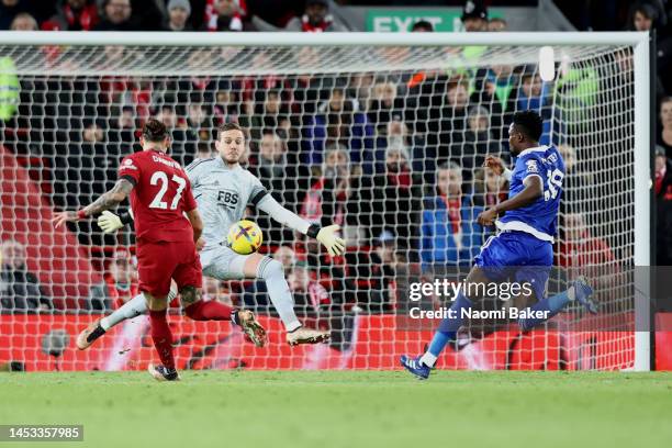 Darwin Nunez of Liverpool sees his shot go past Danny Ward of Leicester City and hit the post as Wout Faes of Leicester City meets the off the post...