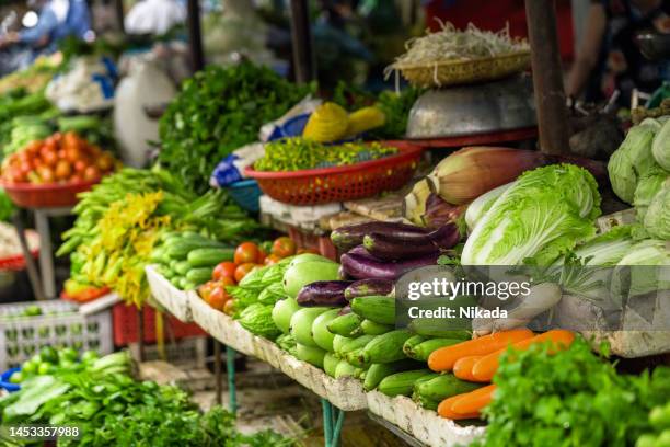 fresh vegetables on street market in south vietnam - vietnam market stock pictures, royalty-free photos & images