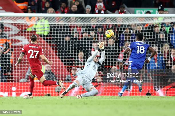 Darwin Nunez of Liverpool sees his shot go past Danny Ward of Leicester City and hit the post as Wout Faes of Leicester City meets the off the post...