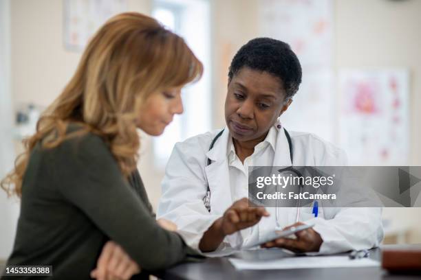 women's health - afro caribbean people stock pictures, royalty-free photos & images