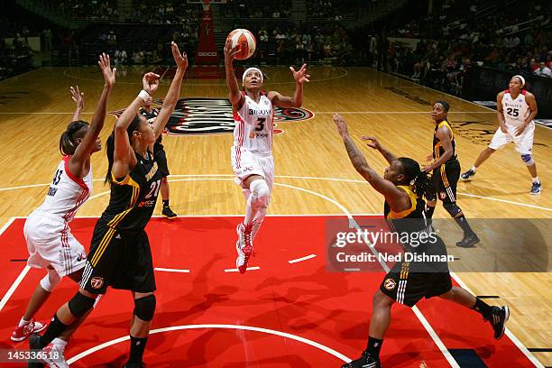 Dominique Canty of the Washington Mystics shoots against Riquna Williams of the Tulsa Shock at the Verizon Center on May 26, 2012 in Washington, DC....