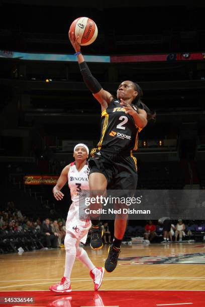 Temeka Johnson of the Tulsa Shock shoots against Dominique Canty of the Washington Mystics at the Verizon Center on May 26, 2012 in Washington, DC....