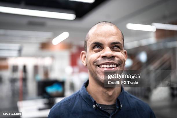 portrait of a mid adult man visually impaired at university - blind man stock pictures, royalty-free photos & images