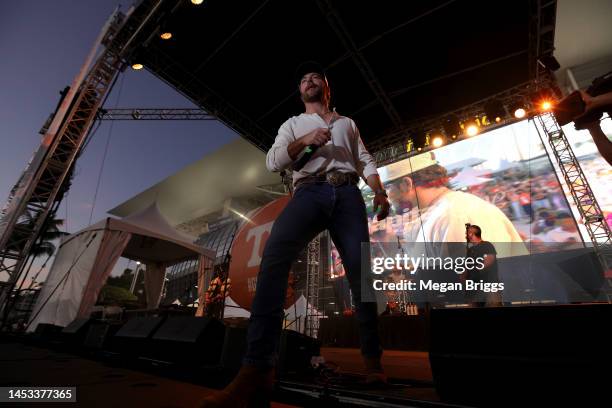 Country music singer Chris Lane performs prior to the Capital One Orange Bowl between the Tennessee Volunteers and the Clemson Tigers at Hard Rock...