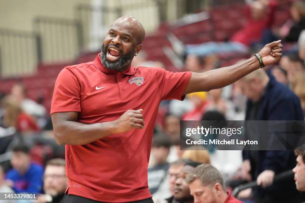 Head coach Mike Jordan of the Lafayette Leopards signals his players in the first half during a college basketball game against the American...