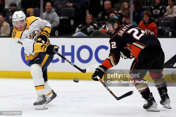 Cody Glass of the Nashville Predators shoots the puck past the defense of Kevin Shattenkirk of the Anaheim Ducks during the third period of a game at...