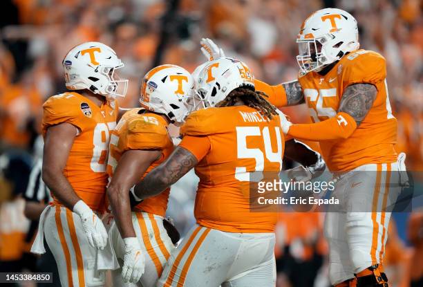 Bru McCoy of the Tennessee Volunteers celebrates with his teammates after scoring a touchdown against the Clemson Tigers during the first quarter of...