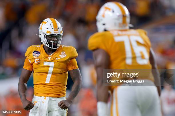 Joe Milton III of the Tennessee Volunteers celebrates a touchdown against the Clemson Tigers during the first quarter of the Capital One Orange Bowl...