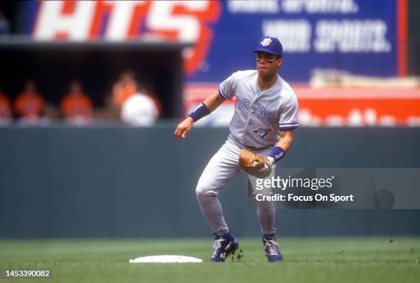 Roberto Alomar of the Toronto Blue Jays in action against the Baltimore Orioles during a Major League Baseball game circa 1992 at Oriole Park at...