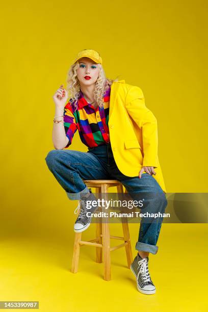 beautiful woman wearing colorful shirt - multi colored blazer stockfoto's en -beelden