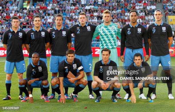 The English national team from L-R, England's James Milner, England's Stewart Downing, England's Phil Jagielka, England's Phil Jones, England's goal...