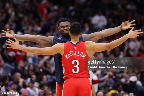 McCollum and Zion Williamson of the New Orleans Pelicans celebrate during the second half against the Philadelphia 76ers at the Smoothie King Center...