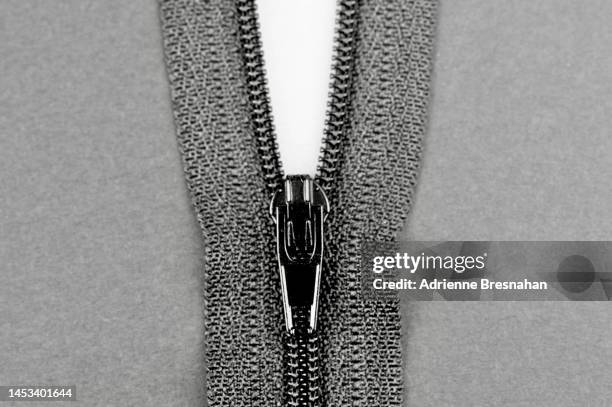 grey zipper - zipper stock pictures, royalty-free photos & images