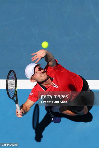 David Goffin of Belgium serves in the Men's singles match against Grigor Dimitrov of Bulgaria during day three of the 2023 United Cup at RAC Arena on...