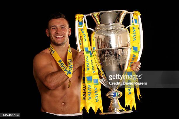 Danny Care of Harlequins poses with the trophy following his team's victory during the Aviva Premiership final between Harlequins and Leicester...