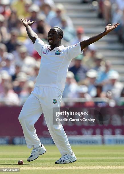 Kemar Roach of the West Indies successfully appeals for the wicket Ian Bell of England during day three of the second Test match between England and...