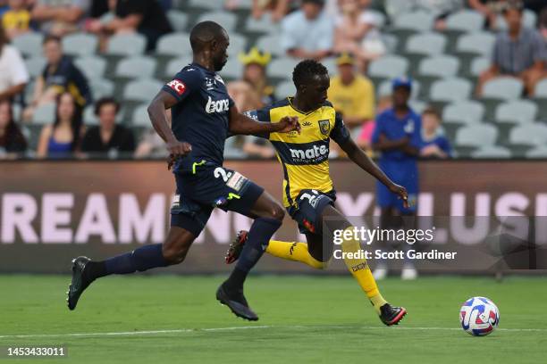 Garang Kuol of the Mariners kicks the ball during the round 10 A-League Men's match between Central Coast Mariners and Melbourne Victory at Central...