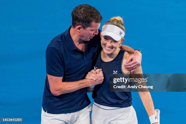 Katie Swan of Great Britain celebrates winning match point with Captain Tim Henman in the Group D match against Nuria Parrizas Diaz of Spain during...