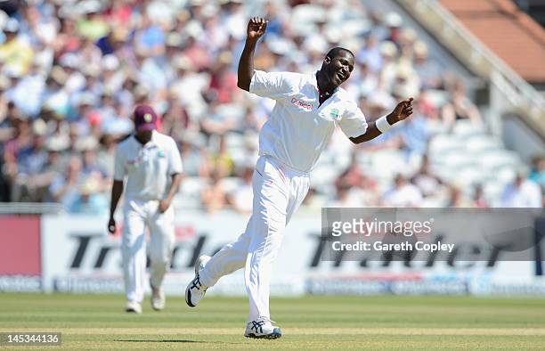 West Indies captain Darren Sammy celebrates dismissing England captain Andrew Strauss during day three of the second Test match between England and...
