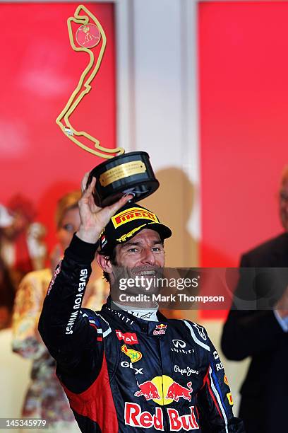 Mark Webber of Australia and Red Bull Racing celebrates winning the Monaco Formula One Grand Prix at the Circuit de Monaco on May 27, 2012 in Monte...