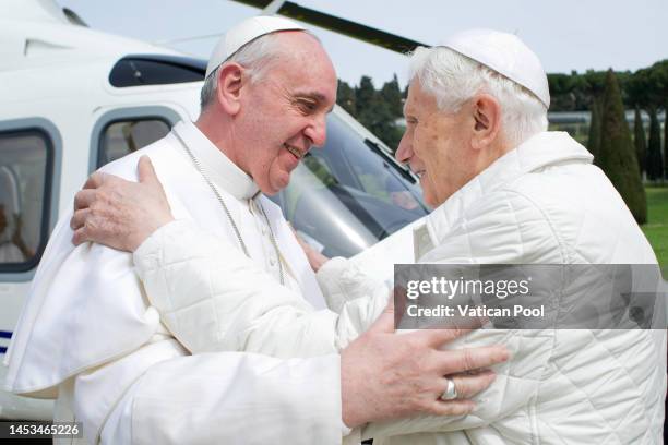 Pope Francis, who was elected on March 13, greets Pope Emeritus Benedict XVI as he arrives by helicopter at the papal summer residence of Castel...