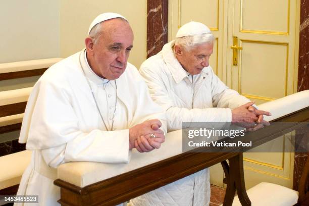 Pope Francis, who was elected on March 13, prays with Pope Emeritus Benedict XVI , as he arrives by helicopter at the papal summer residence of...