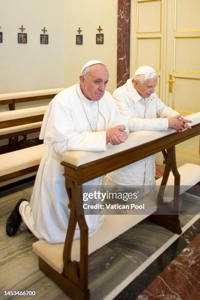 Pope Francis, who was elected on March 13, prays with Pope Emeritus Benedict XVI , as he arrives by helicopter at the papal summer residence of...