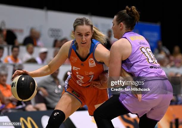 Courtney Woods of the Fire drives to the basket during the round eight WNBL match between Townsville Fire and Melbourne Boomers at Townsville...