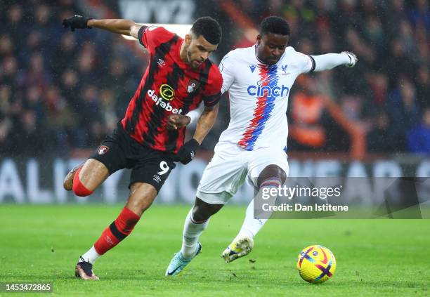 Dominic Solanke of AFC Bournemouth is challenged by Marc Guehi of Crystal Palace during the Premier League match between AFC Bournemouth and Crystal...