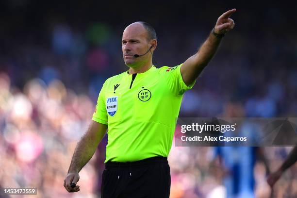 Referee Antonio Mateu Lahoz looks on during the LaLiga Santander match between FC Barcelona and RCD Espanyol at Spotify Camp Nou on December 31, 2022...