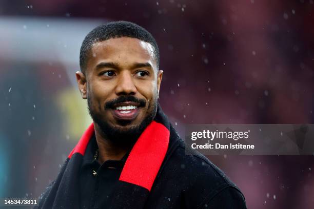 Michael B. Jordan, Minority Shareholder of AFC Bournemouth, wears a AFC Bournemouth scarf as they look on prior to the Premier League match between...