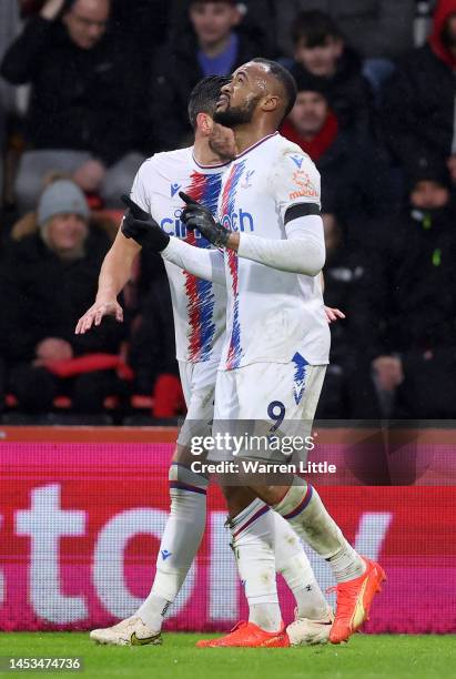 Jordan Ayew of Crystal Palace celebrates after scoring the team's first goal with teammates during the Premier League match between AFC Bournemouth...