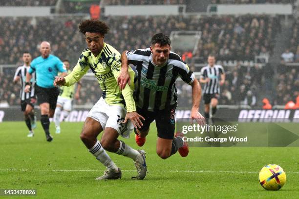 Tyler Adams of Leeds United challenges Fabian Schar of Newcastle United during the Premier League match between Newcastle United and Leeds United at...