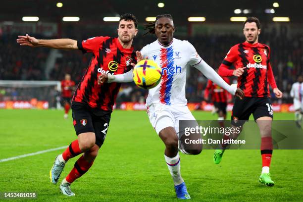 Eberechi Eze of Crystal Palace is challenged by Marcos Senesi of AFC Bournemouth during the Premier League match between AFC Bournemouth and Crystal...