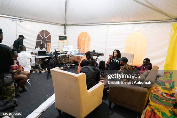 Radio and TV broadcasters in their tent during the Afro Nation Ghana Music Festival on December 30, 2022 in Accra, Ghana. Afro Nation Ghana, the...