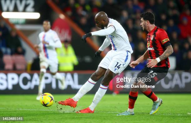 Jean-Philippe Mateta of Crystal Palace has a shot on goal whilst under pressure from Marcos Senesi of AFC Bournemouth during the Premier League match...