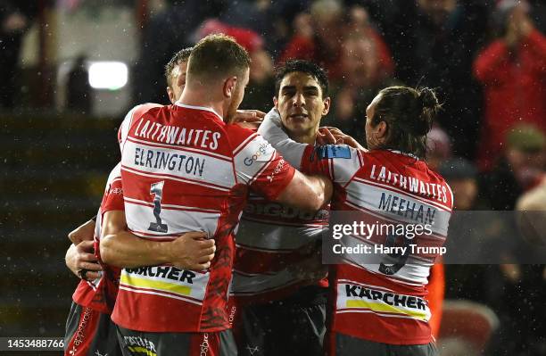 Santiago Carreras of Gloucester Rugby celebrates alongside team mates after kicking a penalty in the last minute to win the match following the...