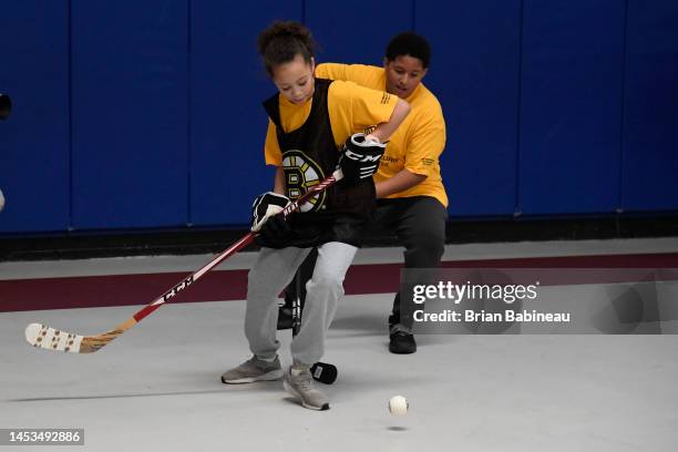 Kids play street hockey during the 2023 NHL Winter Classic Legacy Project at the Boys and Girls Club Marr Clubhouse on December 31, 2022 in...