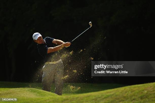 Richard Sterne of South Africa hits his second shot on the 16th hole during the final round of the BMW PGA Championship on the West Course at...