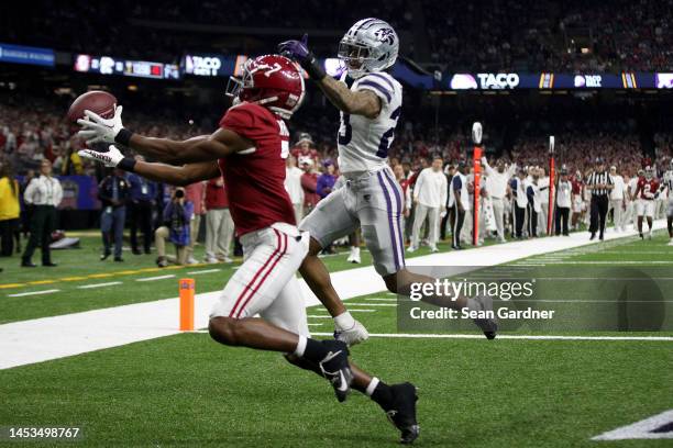 Jermaine Burton of the Alabama Crimson Tide catches a touchdown pass over Julius Brents of the Kansas State Wildcats during the third quarter of the...