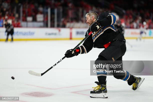 Alex Ovechkin of the Washington Capitals takes a slapshot before the game against the Montreal Canadiens at Capital One Arena on December 31, 2022 in...