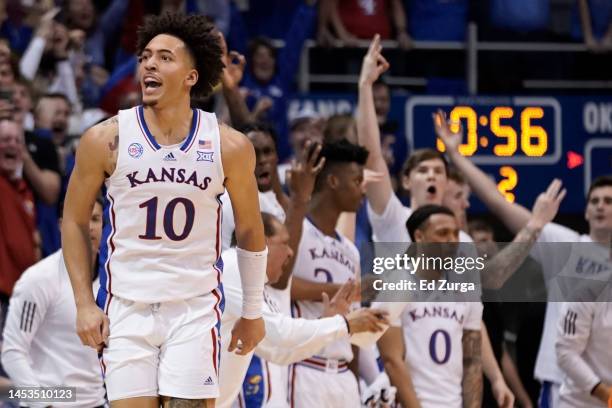 Jalen Wilson of the Kansas Jayhawks celebrates a basket against the Oklahoma State Cowboys in the second half at Allen Fieldhouse on December 31,...